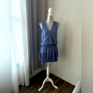 Pastel blue vacation dress with cinched waist and layers very flattering.